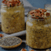 Overnight oats with chia seeds and pecan topping in jars for high protein meal prep.